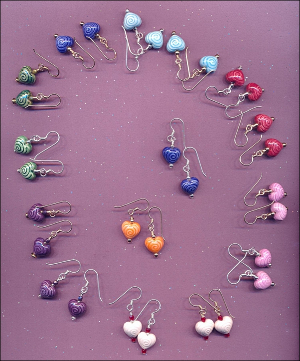 closeup image heart earrings